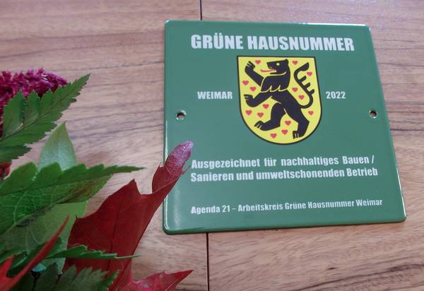 Plakette: Grüne Hausnummer